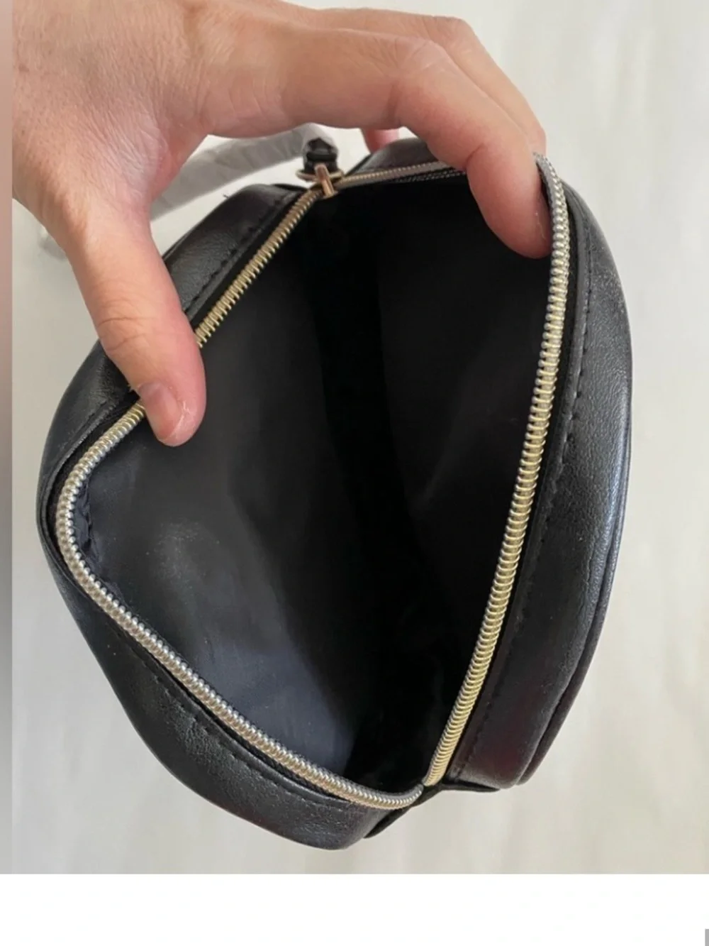 Shiseido black round cosmetic bag